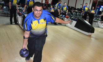 Bowler in a Royals bowling shirt.