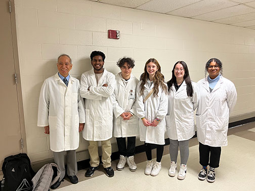 Microbiology students and faculty member, Dr. Renato Tameta, at Ellis Hospital.