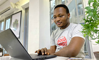 Man working on a laptop.