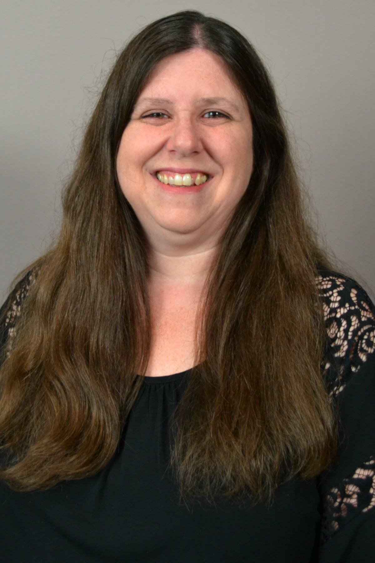 Professor Rae Doyle smiling, headshot